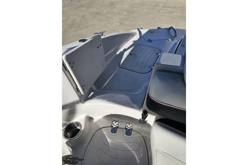 Slide: The Image of 2015 Tahoe 215 Xi boat interior with seating and storage compartments. - 109