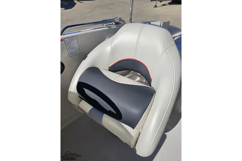 Slide: The Image of 2015 Tahoe 215 Xi boat seat with white and black upholstery. - 64