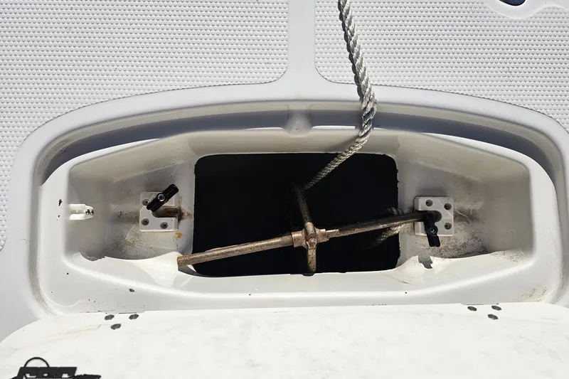 Slide: The Image of Anchor compartment of a 2015 Tahoe 215 Xi boat with rope and fittings. - 98