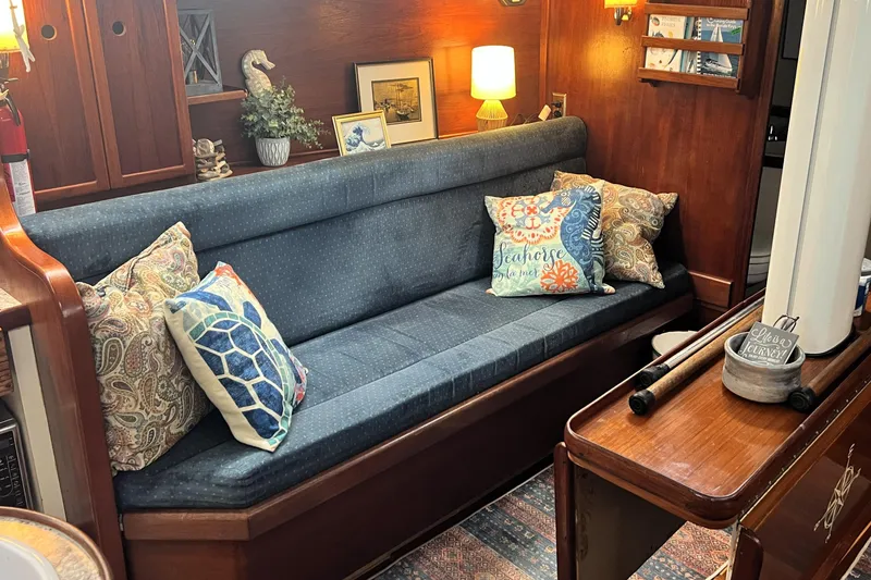 Slide: The Image of Navigation station in 1985 Gulfstar Hirsch Center Cockpit yacht with charts and equipment. - 14