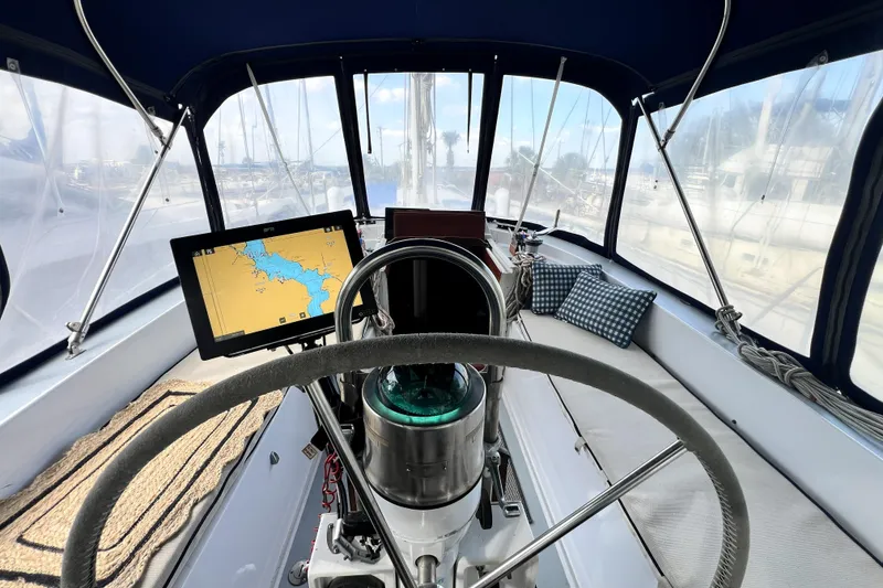 Slide: The Image of Interior of 1985 Gulfstar Hirsch Center Cockpit with shower and motivational decor. - 17