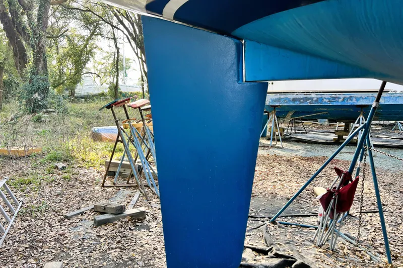 Slide: The Image of Interior of 1985 Gulfstar Hirsch Center Cockpit yacht with wooden closet and hanging jacket. - 21