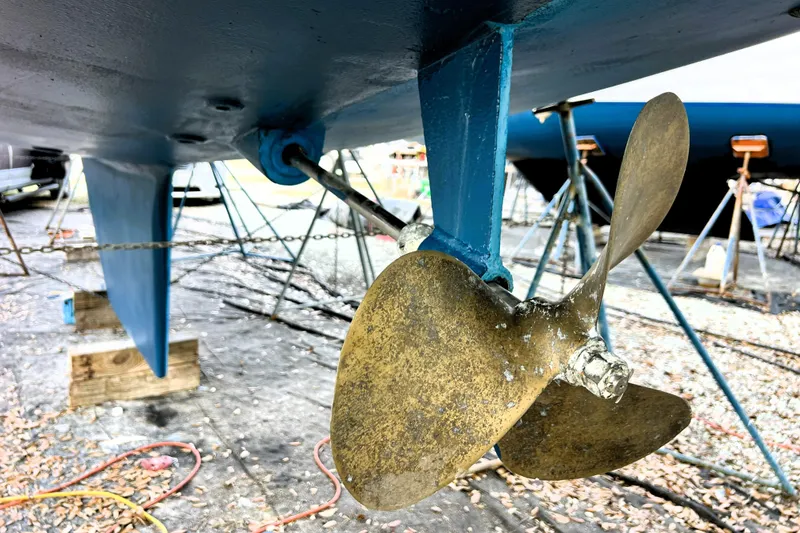 Slide: The Image of 1985 Gulfstar Hirsch Center Cockpit sailboat interior with steering wheel and canopy. - 23