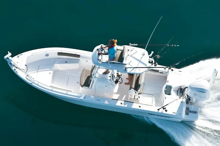Slide: The Image of Manufacturer Provided Image: 2017 Everglades 243 Center Console boat cruising on clear blue water. - 5