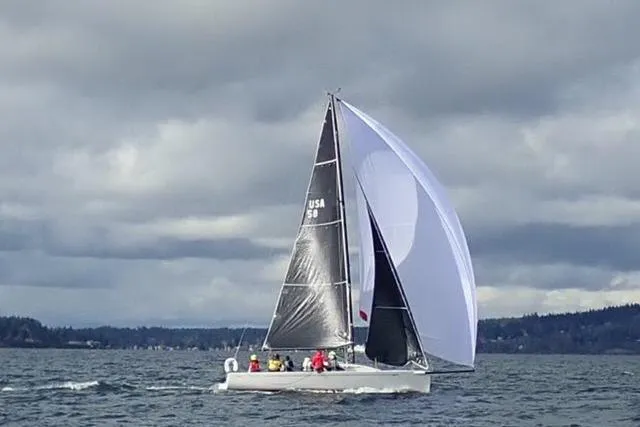 Slide: The Image of Sailing yacht Flying Tiger 10M, 2006 model, on a cloudy day at sea. - 14