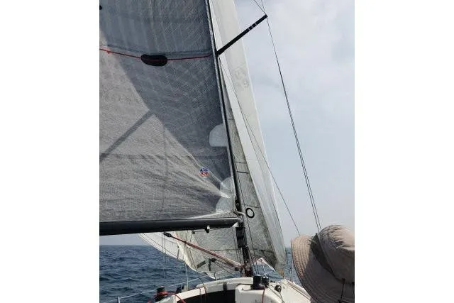 Slide: The Image of Sailing on a 2006 Flying Tiger 10M yacht with sails unfurled on open water. - 7
