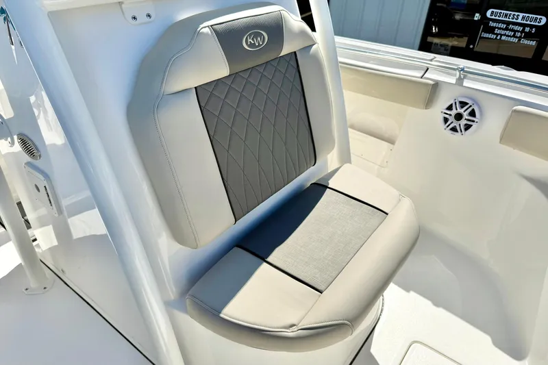 Slide: The Image of 2026 Key West 239 FS boat seat with gray and white upholstery. - 18