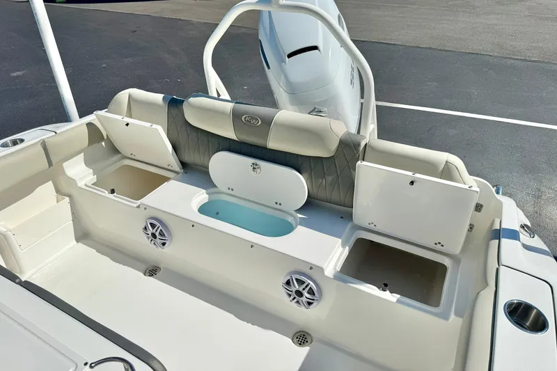 Slide: The Image of 2026 Key West 239 FS boat interior with storage compartments and seating. - 35