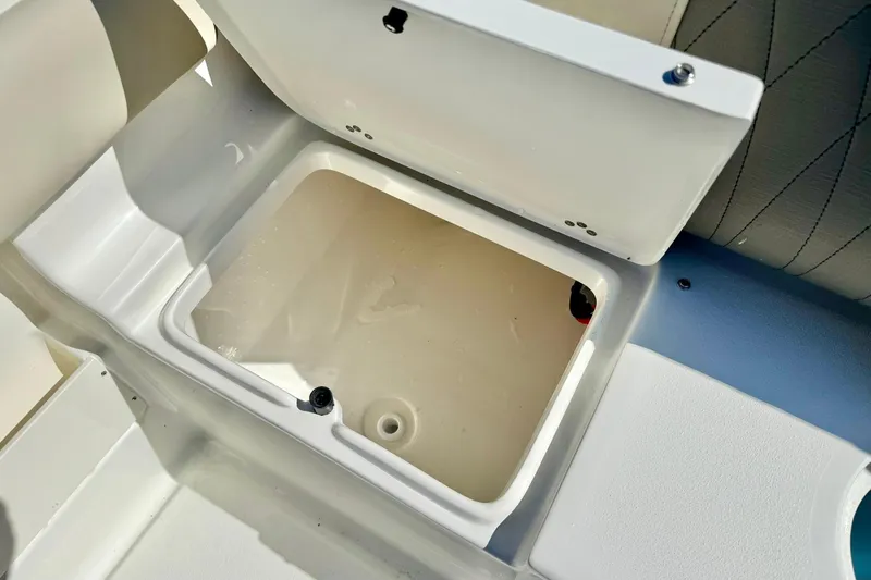 Slide: The Image of Open storage compartment on 2026 Key West 239 FS boat, showcasing interior space. - 36