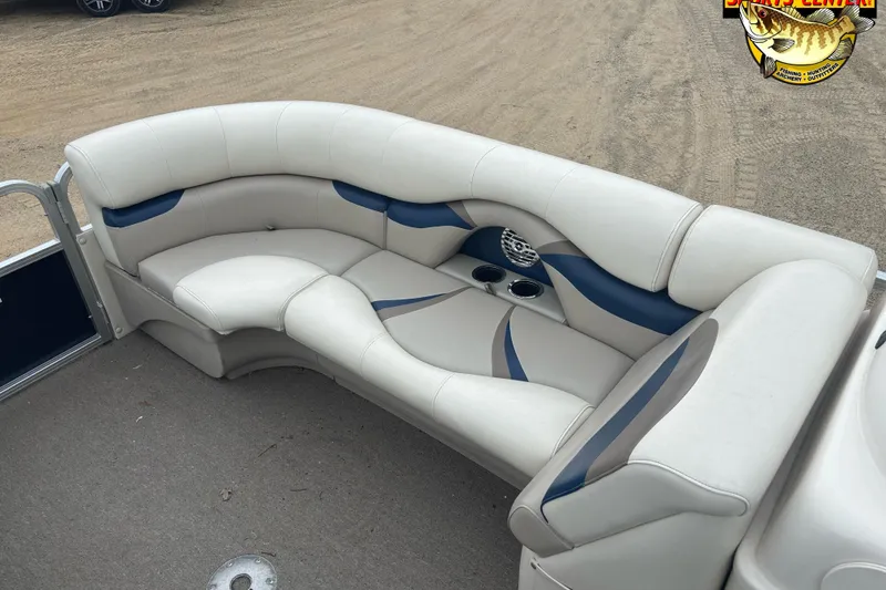 Slide: The Image of Luxurious seating on a 2012 Sylvan 820 Mirage Cruise pontoon boat, featuring cup holders and stylish design. - 10