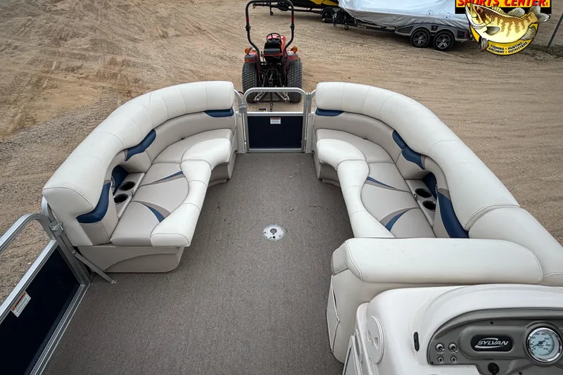 Slide: The Image of 2012 Sylvan 820 Mirage Cruise pontoon boat with spacious seating and modern design. - 12
