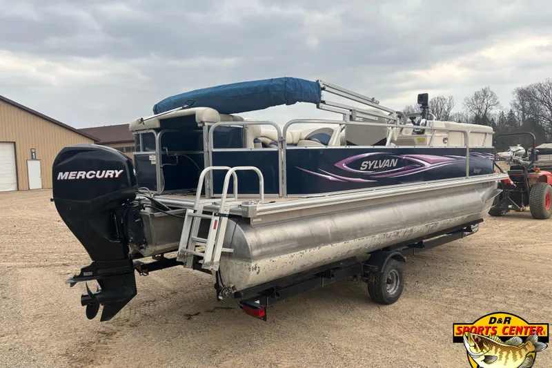 Slide: The Image of 2012 Sylvan 820 Mirage Cruise pontoon boat with Mercury engine on trailer. - 3