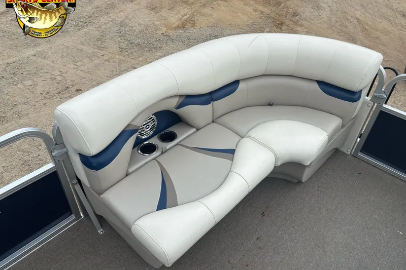Slide: The Image of Luxurious seating on 2012 Sylvan 820 Mirage Cruise pontoon boat, featuring cup holders and speaker. - 9