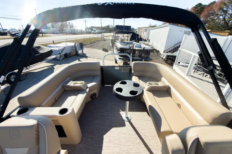 Slide: The Image of 2026 Godfrey Sweetwater Xperience 22' Tritoon with split bench seating and canopy. - 21