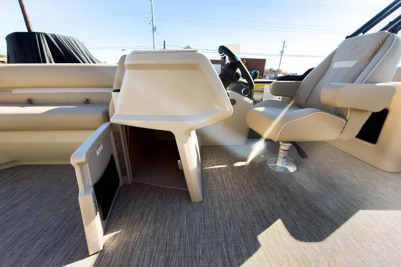 Slide: The Image of 2026 Godfrey Sweetwater Xperience 22' Tritoon interior with helm and seating area. - 30