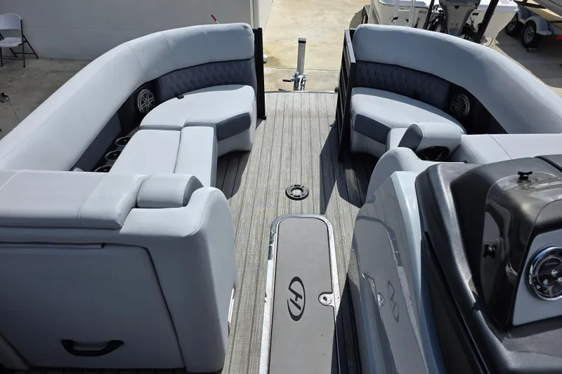 Slide: The Image of Luxurious seating on 2021 Harris Solstice 230 SL pontoon boat with sleek design. - 12