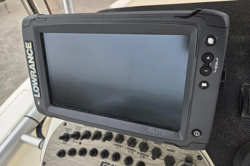 Slide: The Image of Lowrance Elite GPS system on 2014 Carolina Skiff Sea Skiff 21 CC boat dashboard. - 11