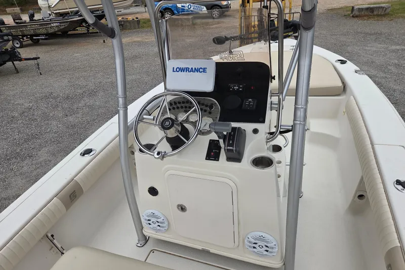 Slide: The Image of 2014 Carolina Skiff Sea Skiff 21 CC boat console with steering wheel and Lowrance equipment. - 12