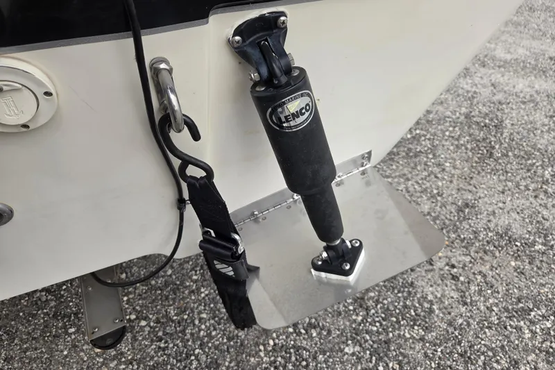 Slide: The Image of 2014 Carolina Skiff Sea Skiff 21 CC with Lenco trim tab detail. - 17