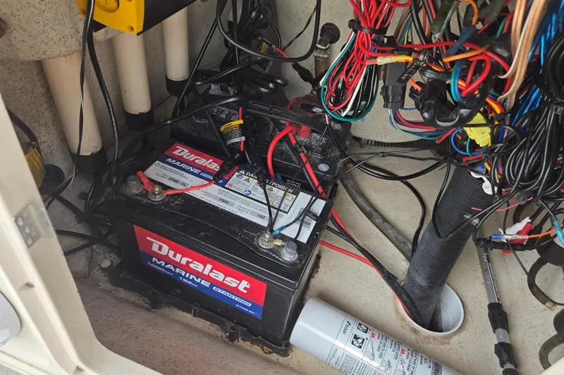 Slide: The Image of Marine battery and wiring inside a 2014 Carolina Skiff Sea Skiff 21 CC boat. - 9
