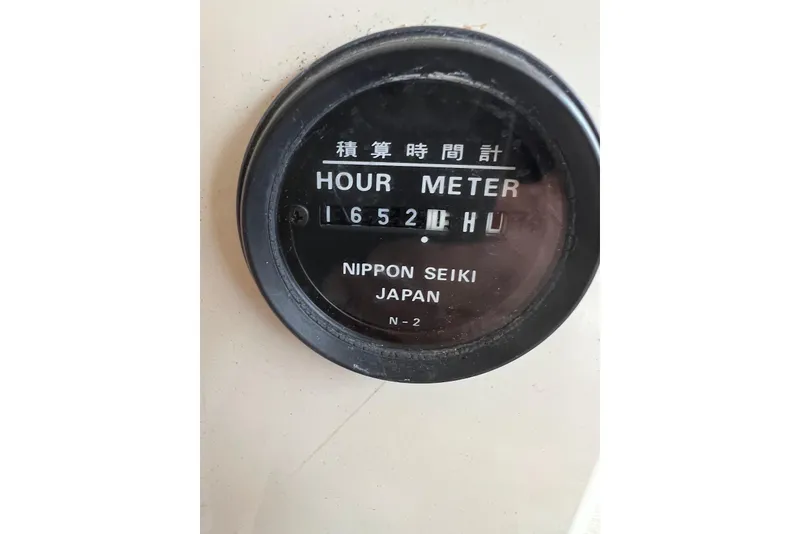 Slide: The Image of Hour meter reading 1652 hours on a 1998 General Marine Custom Downeast boat. - 19