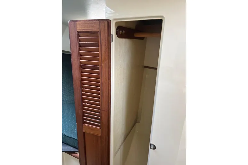 Slide: The Image of 1998 General Marine Custom Downeast boat interior with wooden closet door. - 24