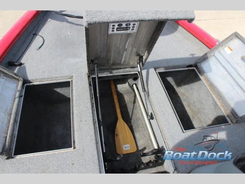 Slide: The Image of 2017 Pro Team 175 TXW boat with storage compartments and paddle. - 13