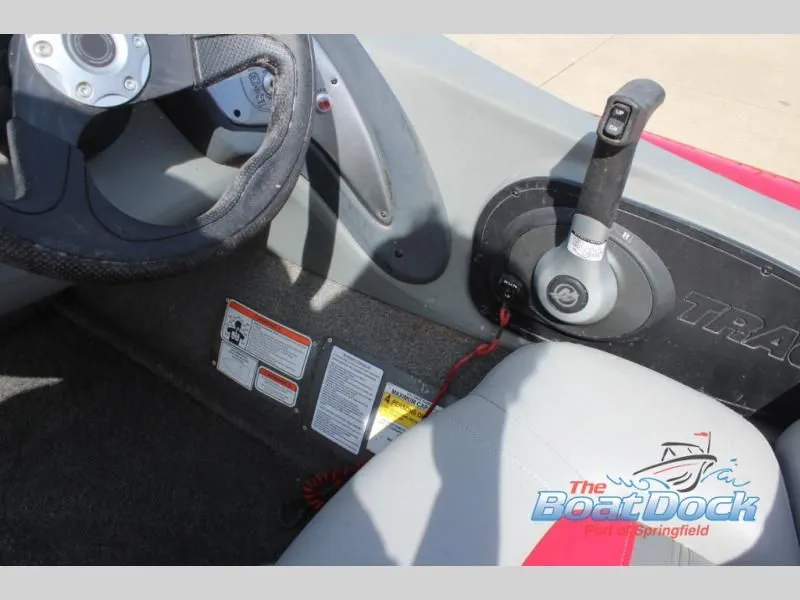 Slide: The Image of Interior of a 2017 Pro Team 175 TXW boat with controls. - 17