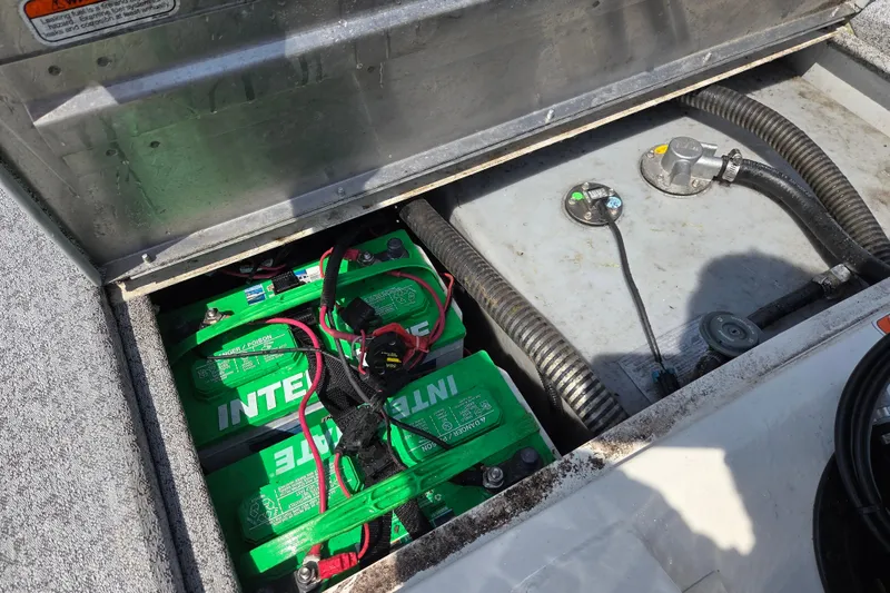 Slide: The Image of Battery compartment of 2021 Tracker Pro Team 175 TXW Tournament Edition boat. - 12