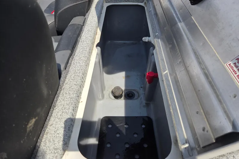 Slide: The Image of 2021 Tracker Pro Team 175 TXW Tournament Edition boat storage compartment. - 13