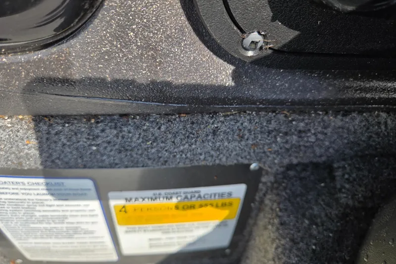 Slide: The Image of 2021 Tracker Pro Team 175 TXW Tournament Edition boat capacity label close-up. - 7