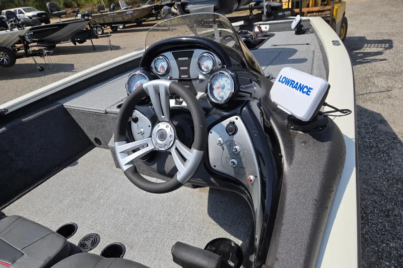 Slide: The Image of 2021 Tracker Pro Team 175 TXW Tournament Edition boat dashboard with steering wheel and Lowrance device. - 8