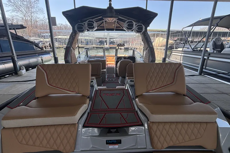Slide: The Image of 2026 Tigé 24RZX boat interior with luxurious seating and modern design. - 12