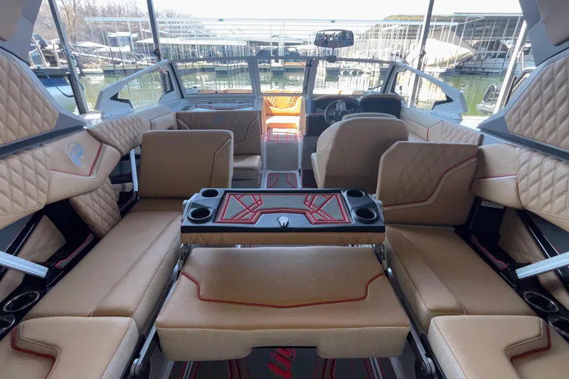 Slide: The Image of Luxurious interior of 2026 Tigé 24RZX boat with beige seating and modern design. - 26