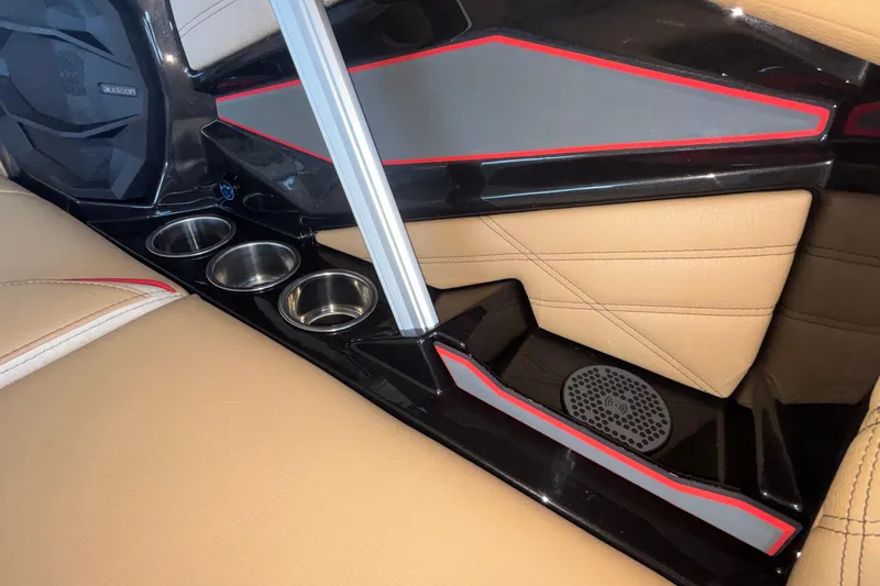 Slide: The Image of Interior of 2026 Tigé 24RZX boat with cup holders and speaker system. - 42