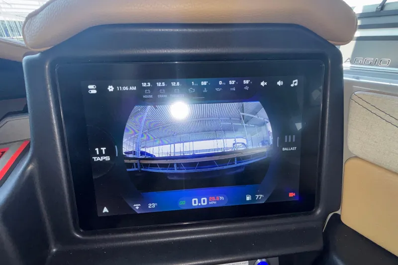 Slide: The Image of Touchscreen display in 2026 Tigé 24RZX boat showing rearview camera and controls. - 45