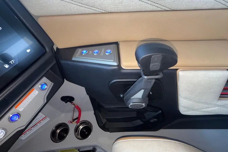 Slide: The Image of Interior controls of a 2026 Tigé 24RZX boat, featuring modern dashboard and switches. - 50