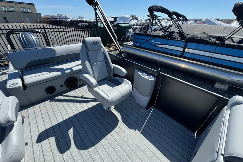 Slide: The Image of 2026 Bentley Pontoons Legacy 243 Swingback interior with luxurious seating and modern design. - 17
