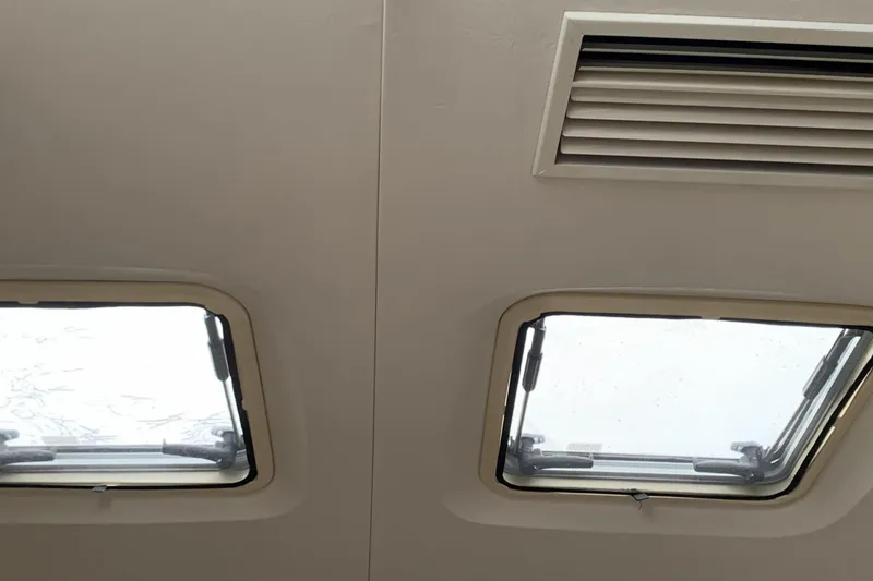 Slide: The Image of Ceiling view of 1998 Silverton 361 Express with two skylights and an air vent. - 22