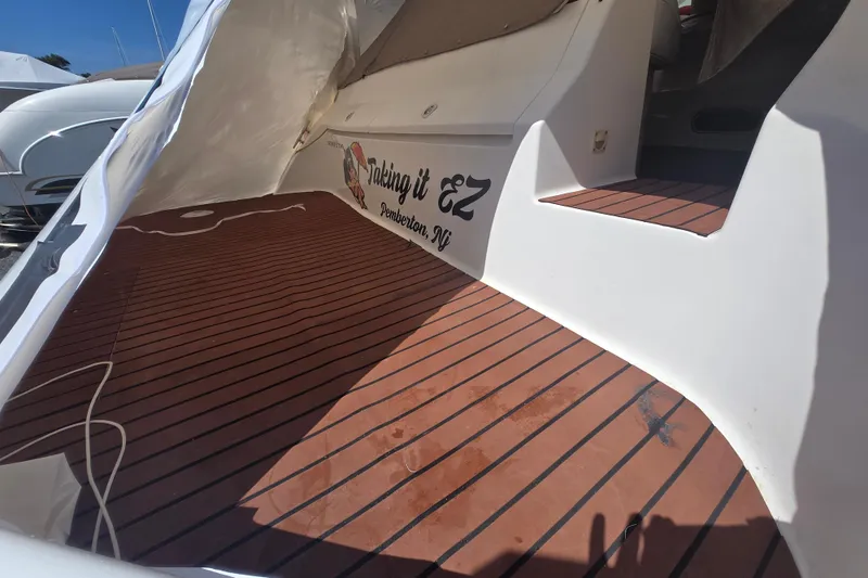 Slide: The Image of 1998 Silverton 361 Express boat deck with custom name "Taking it EZ," Pemberton, NJ. - 8