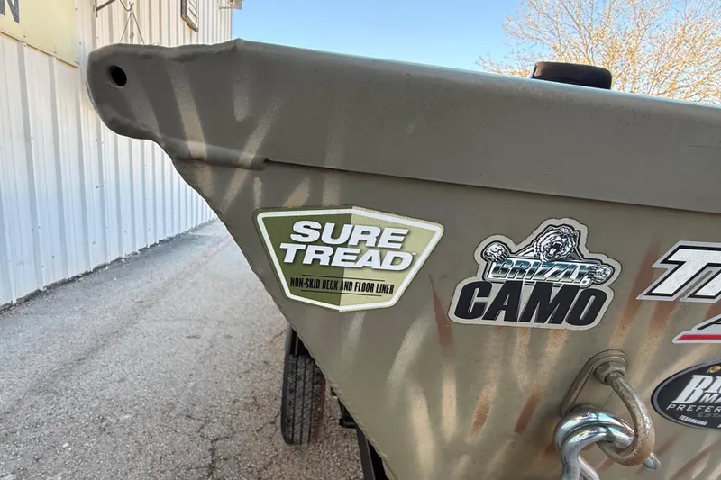 Slide: The Image of 2022 Tracker Grizzly 1648 SC boat with Sure Tread non-skid deck sticker. - 18