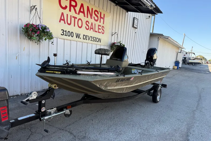Slide: The Image of 2022 Tracker Grizzly 1648 SC boat on trailer at Cransh Auto Sales. - 22