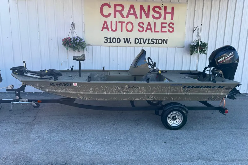 Slide: The Image of 2022 Tracker Grizzly 1648 SC boat at Cransh Auto Sales, featuring Mercury engine. - 25