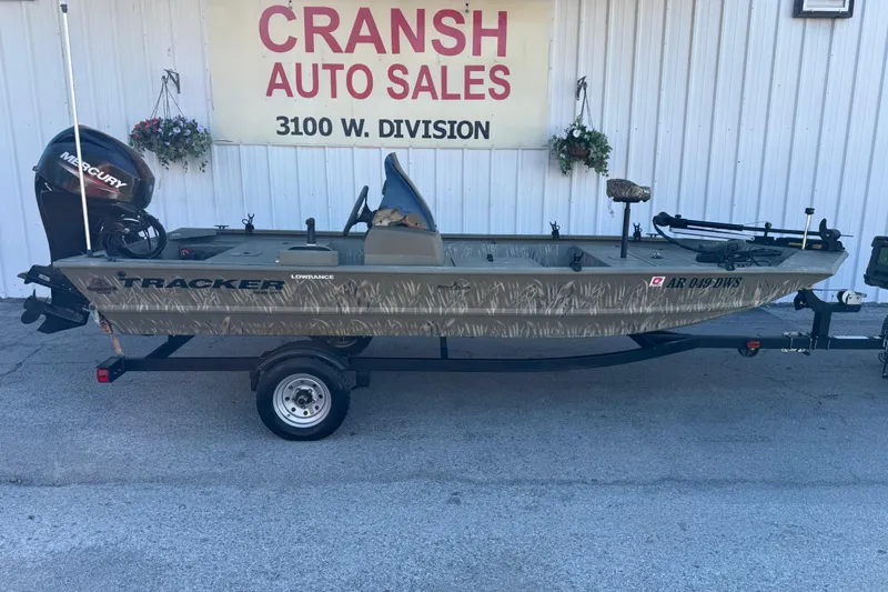 Slide: The Image of 2022 Tracker Grizzly 1648 SC boat at Cransh Auto Sales, featuring Mercury engine. - 5