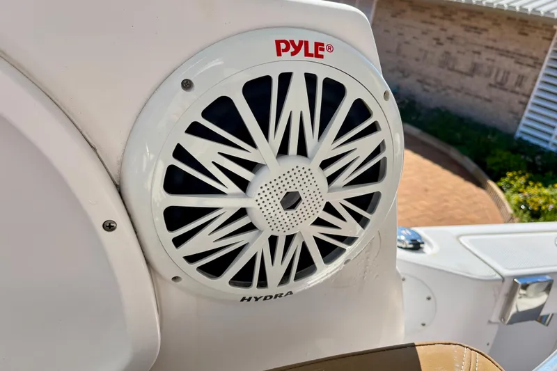 Slide: The Image of Pyle Hydra speaker on 2018 Pro-Line 26 Express boat, outdoor setting. - 24