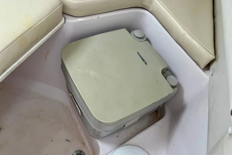 Slide: The Image of Portable toilet in 2018 Pro-Line 26 Express boat interior. - 30