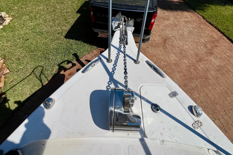 Slide: The Image of Bow view of 2018 Pro-Line 26 Express boat with anchor and chain. - 52