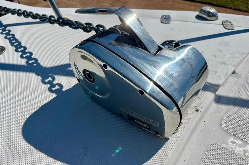 Slide: The Image of Chrome anchor windlass on 2018 Pro-Line 26 Express boat deck. - 54