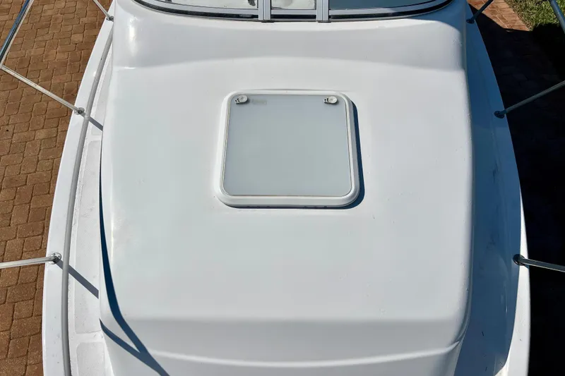 Slide: The Image of 2018 Pro-Line 26 Express boat deck with hatch, viewed from above. - 55