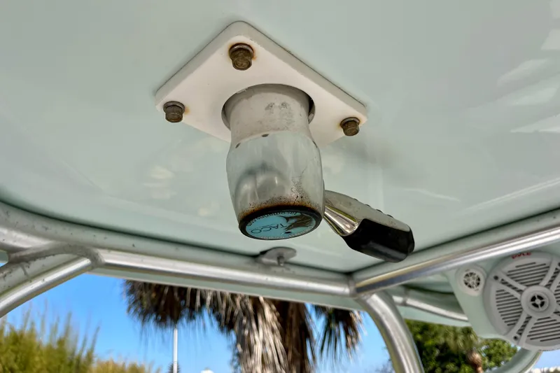 Slide: The Image of Close-up of a 2018 Pro-Line 26 Express boat's ceiling-mounted light fixture. - 62